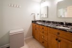 Master bath with stand up shower and double sink vanity